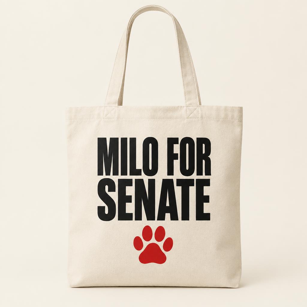 Cream canvas tote bag printed with MILO FOR SENATE and a red paw print